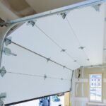 Installation,Of,Rolling,Shutters,Plastic,Garage,Doors,In,New,House