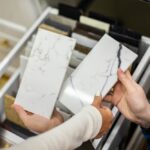 Closeup,Hands,Creative,Female,Interior,Designer,And,Customer,Choosing,Marble