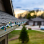 Hanging,Christmas,Lights,On,Gutter,With,Plastic,Clips