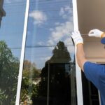 Handyman,Repairing,The,Sliding,Window.,Adjust,Window,Hook,Sliding.